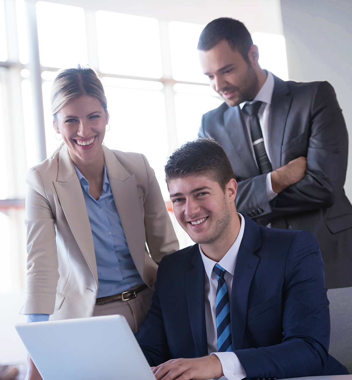 happy young business man portrait in bright modern office indoor